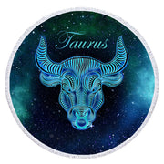 Round Beach Towel with Starsign print in dark blue and bright shiny blue and the stars in the background. Masmarizing Design of your starsign Taurus